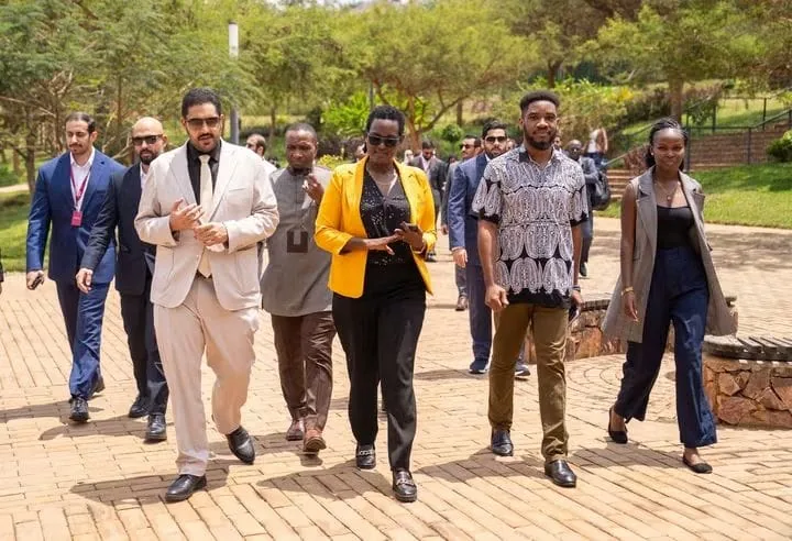 Paul Udah walking with a delegation