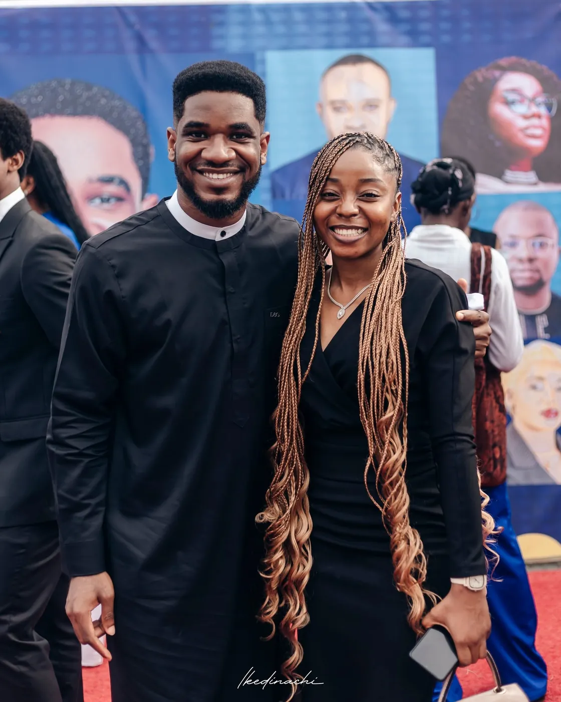 Paul Udah with a guest on the red carpet