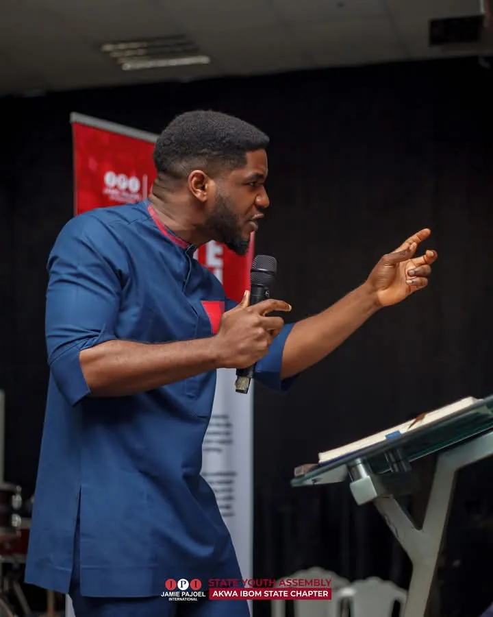 Paul Udah delivering an impactful speech at the State Youth Assembly