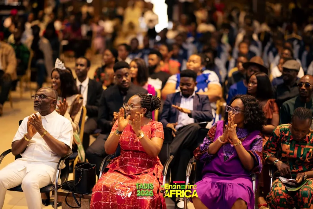 Delegates applaud during a session